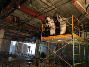removing asbestos fireproofing materials